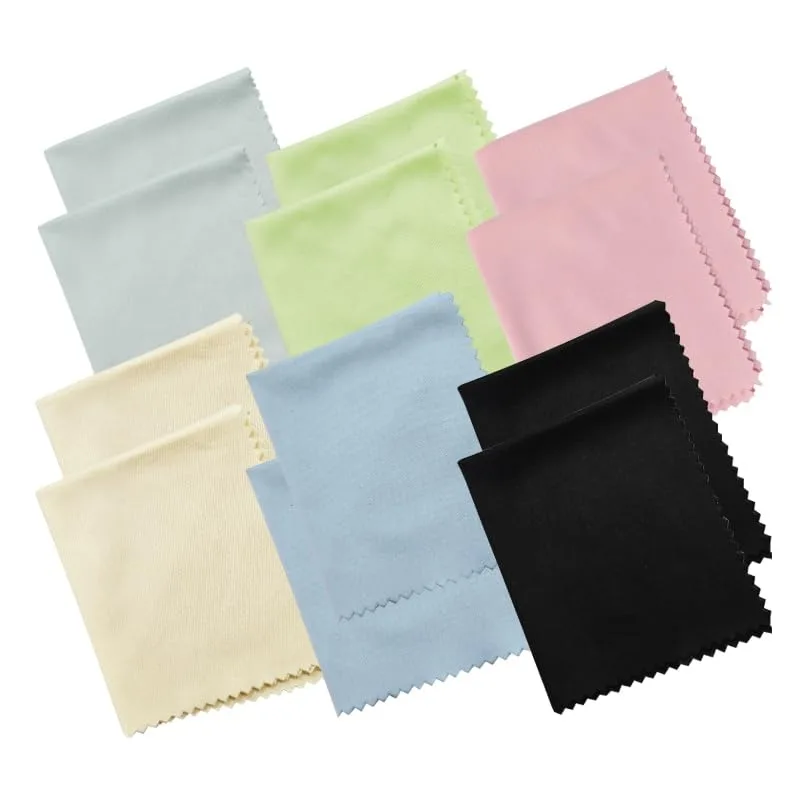 Twelve microfiber cloths in assorted colours, each six by seven inches, folded together