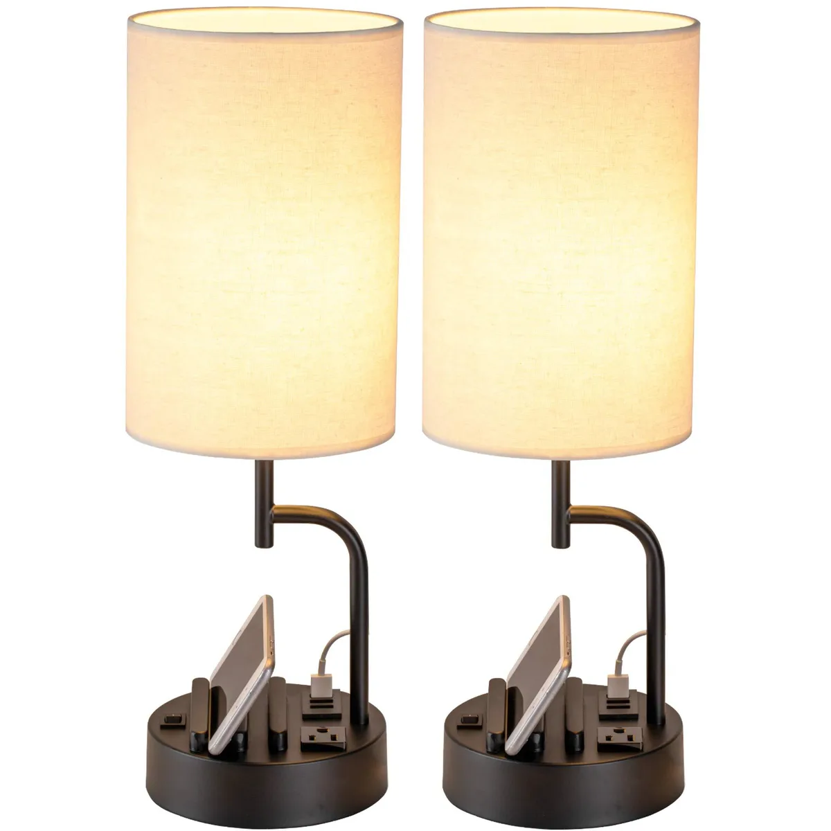 Pair of cream fabric‑shaded table lamps on black metal bases with phone slots, 18.1 inches tall