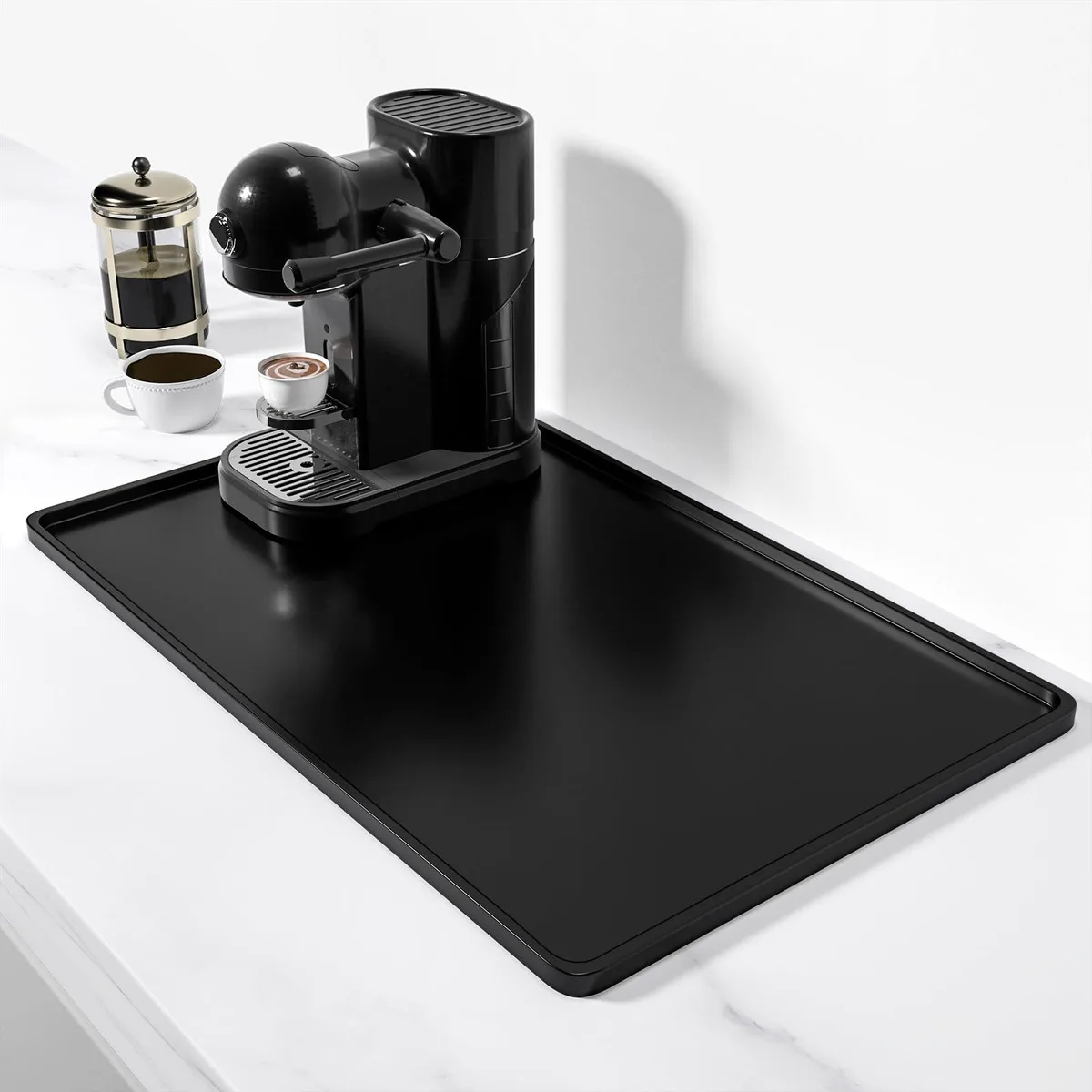 Black rectangular silicone mat measuring 12 by 19 inches with raised edges
