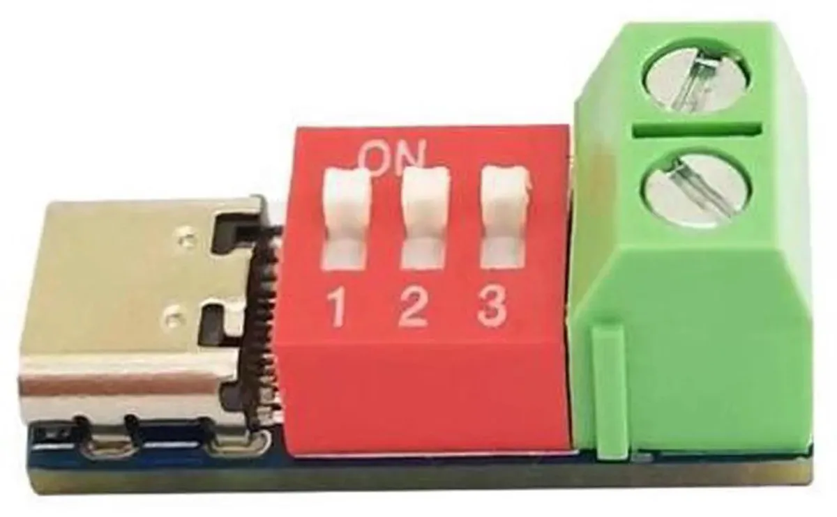 Small green circuit board with USB-C port and solder pads