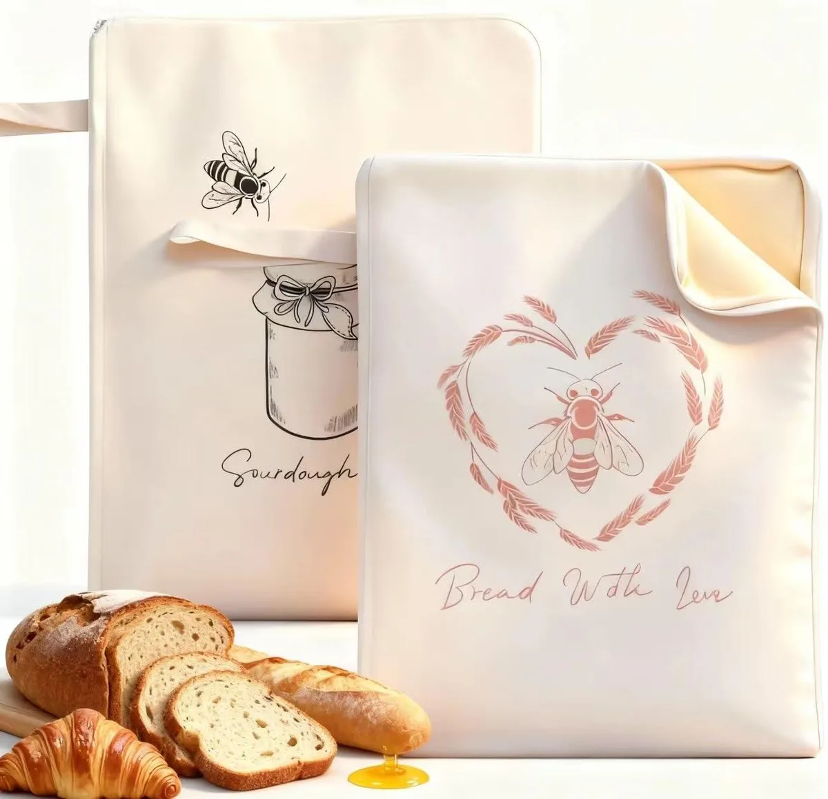 Two beige beeswax-coated linen cotton bread bags with wide zipper access and carry handle