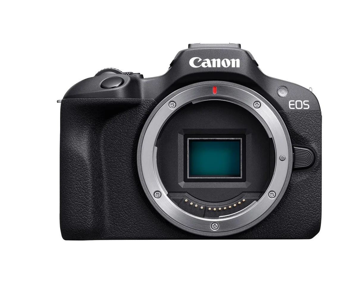 Small black mirrorless camera body with built-in flash and 3.15 inch screen