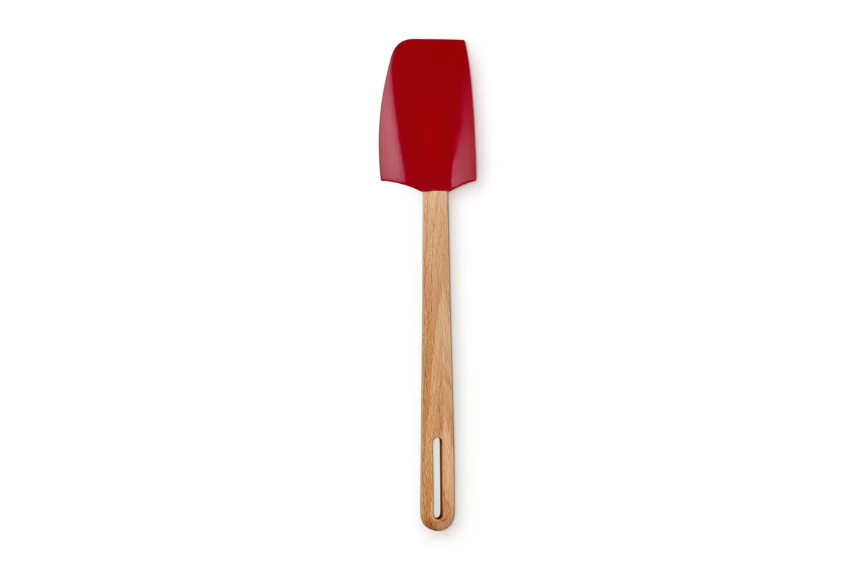 Le Creuset medium silicone spatula in cerise red with beech wood handle