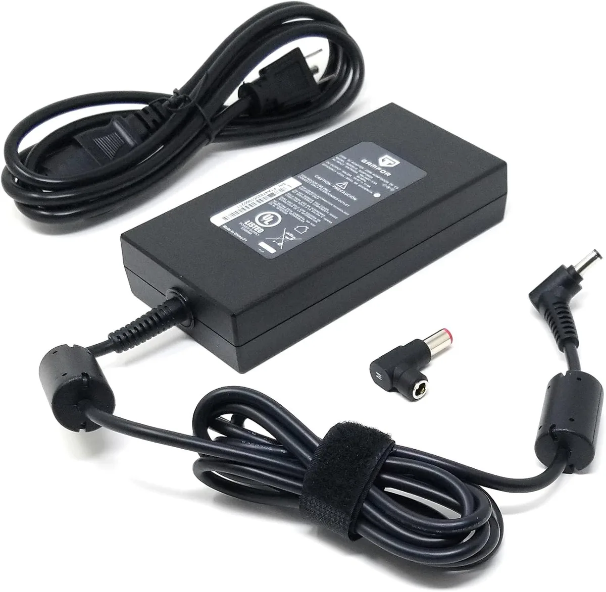 Black rectangular AC adapter with detachable power cord and interchangeable barrel tips