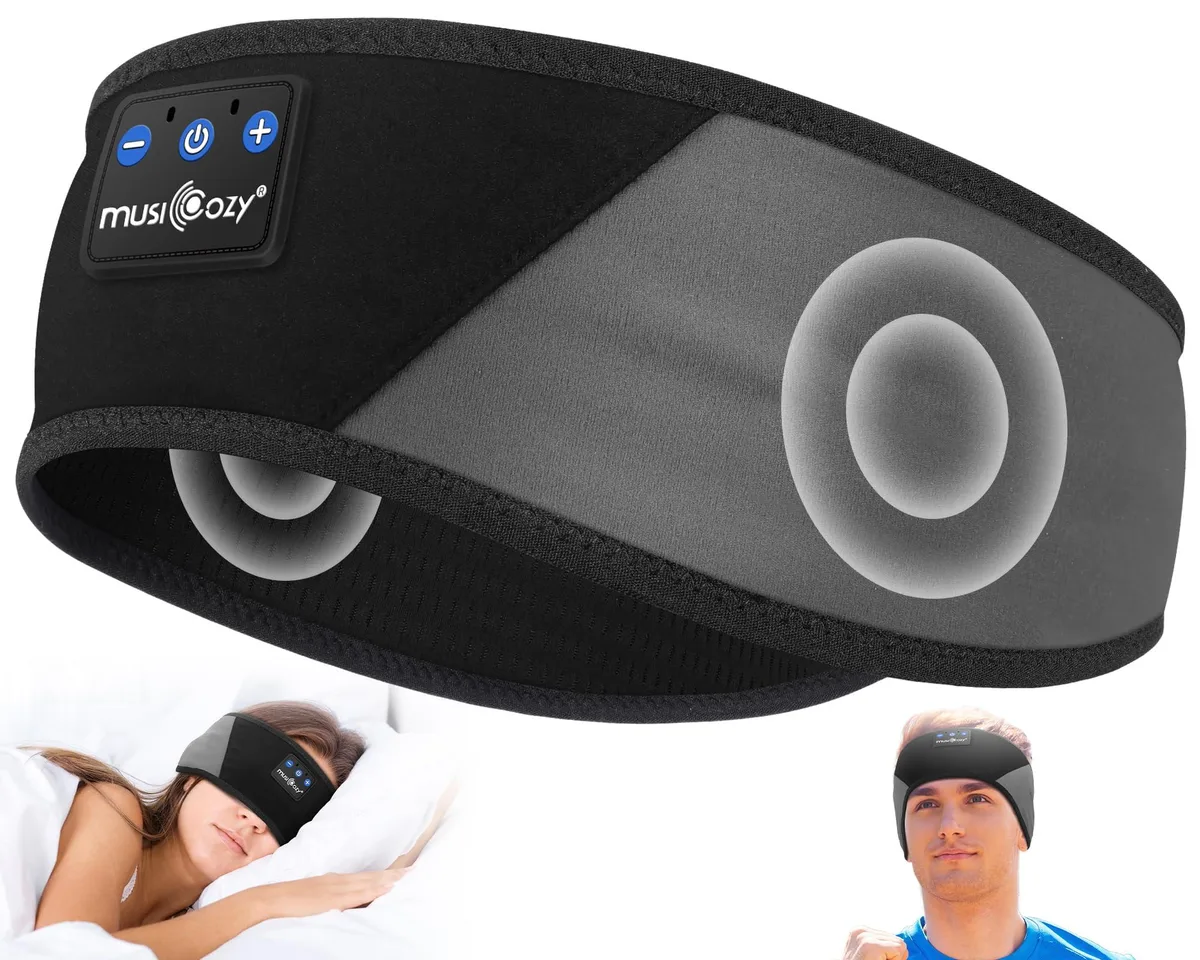 White fabric headband with flat on-ear speakers, USB cable visible