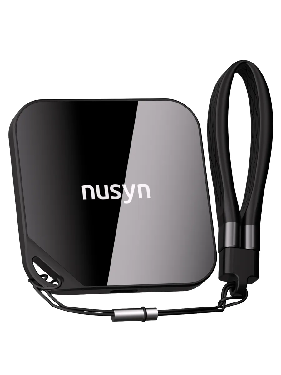 Compact square black portable SSD with rounded edges, thin profile and USB-C cable attached