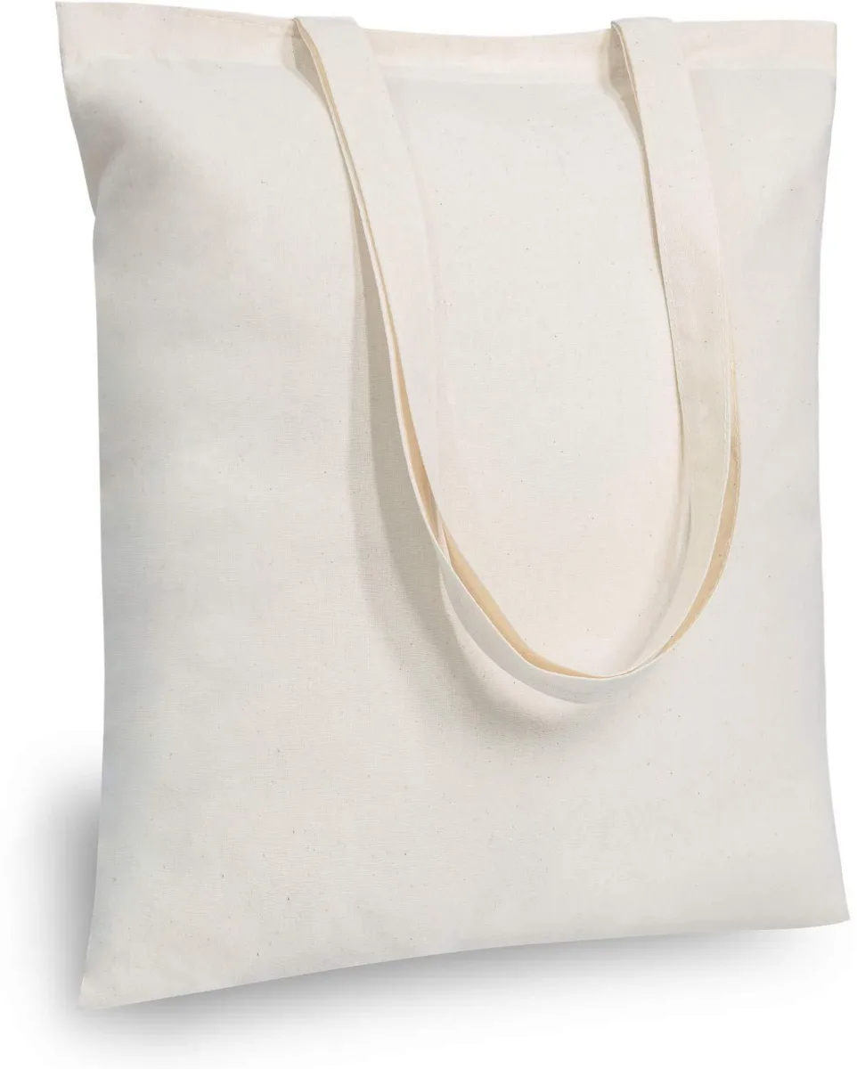 Forty-eight beige cotton tote bags stacked, each 16 by 15 inches with long handles