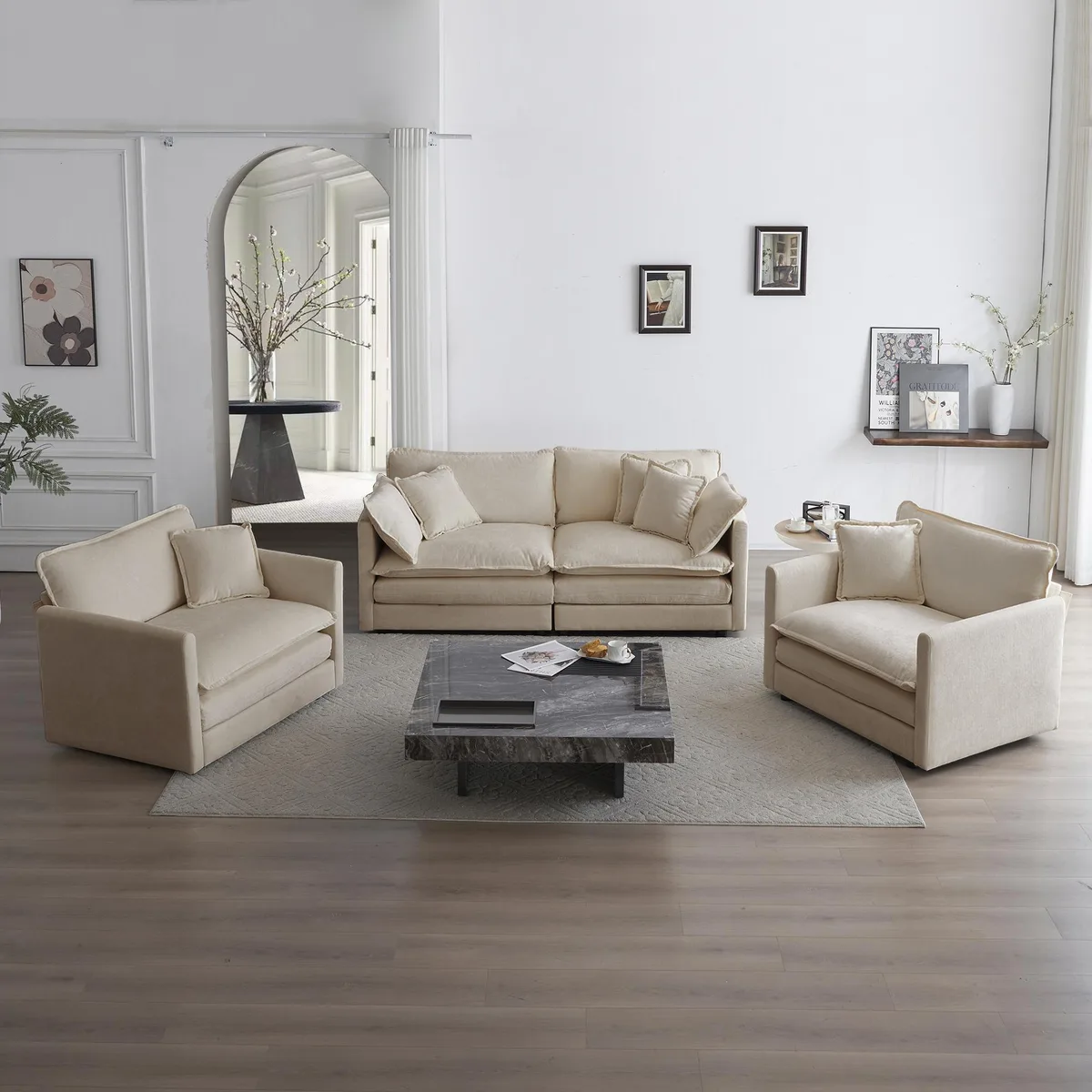 Three-piece beige chenille sofa set with two armchairs and a two-seater, plus arm and toss pillows