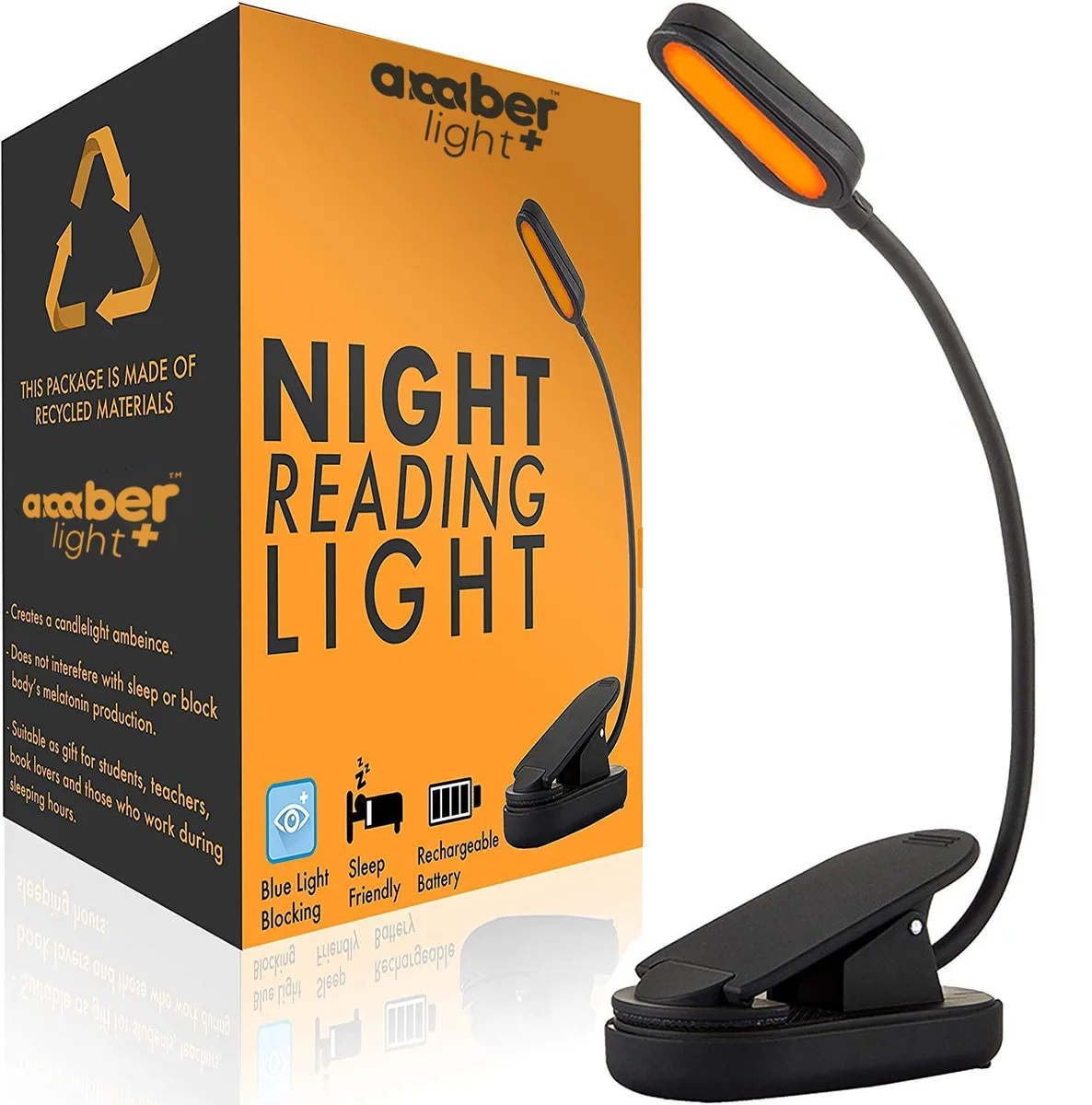 Small rectangular clip-on book light with painted plastic finish and padded clamp