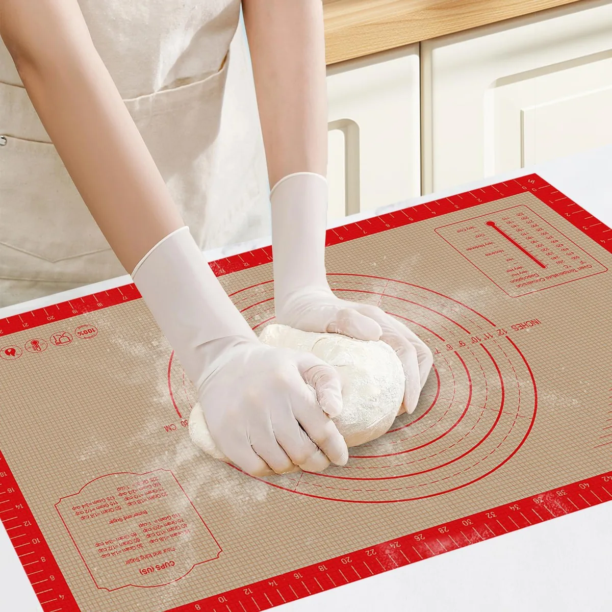 Rectangular light-coloured silicone mat with printed grid and measurement markings