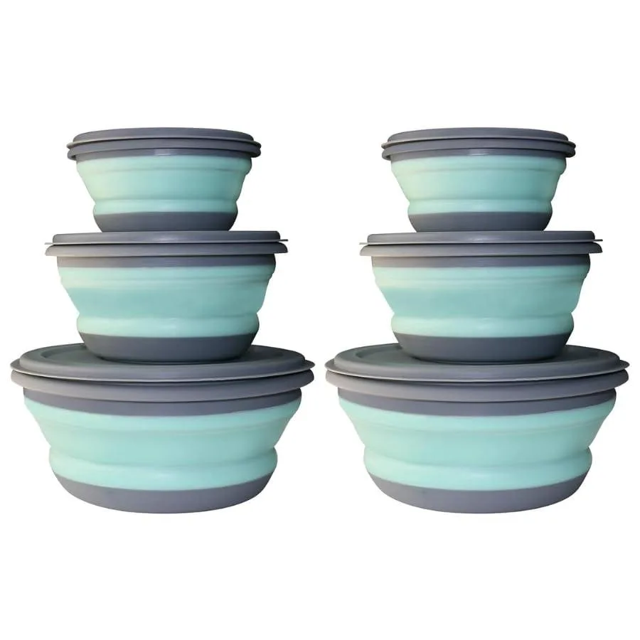 Six red collapsible silicone bowls with lids nested flat