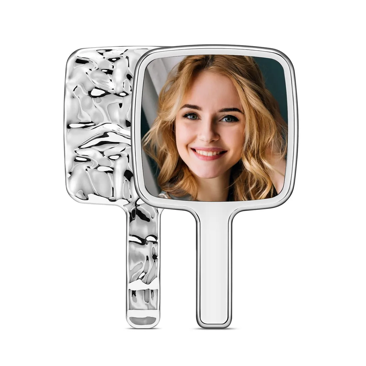 Silver rectangular handheld mirror with water ripple pattern on back and handle