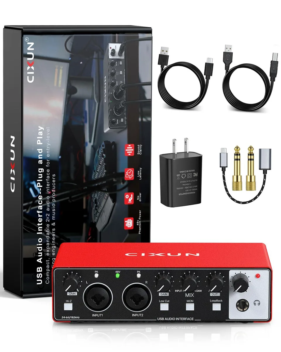 Compact red USB audio interface with dual XLR combo inputs and knobs
