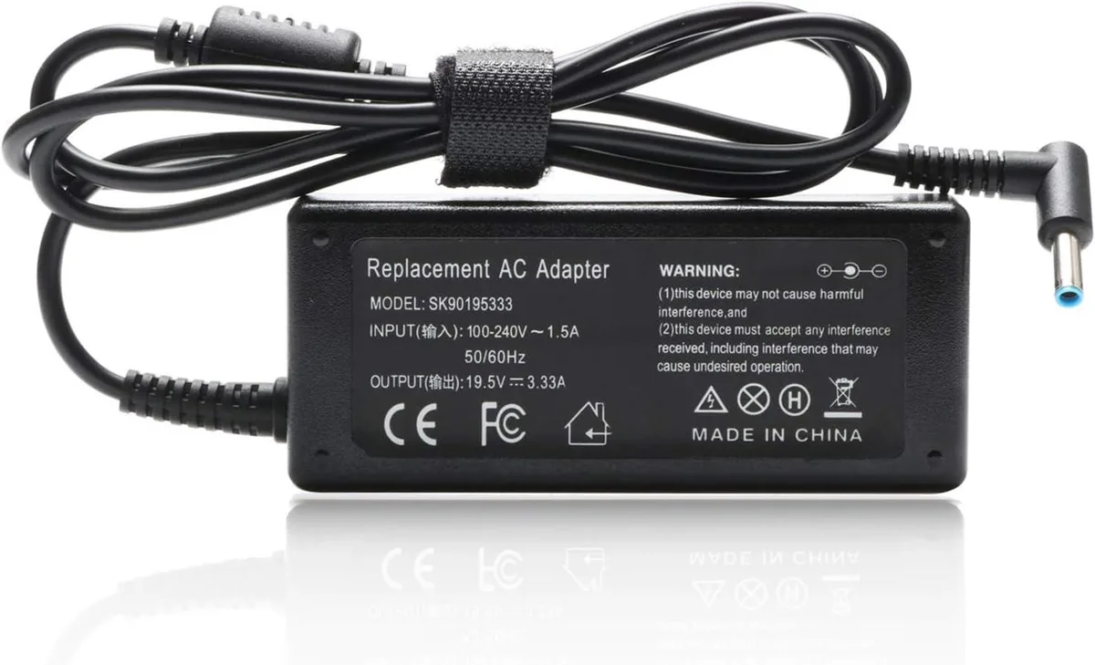 Black rectangular AC adapter with a 4.5mm blue-tip connector and a long 10ft power cord