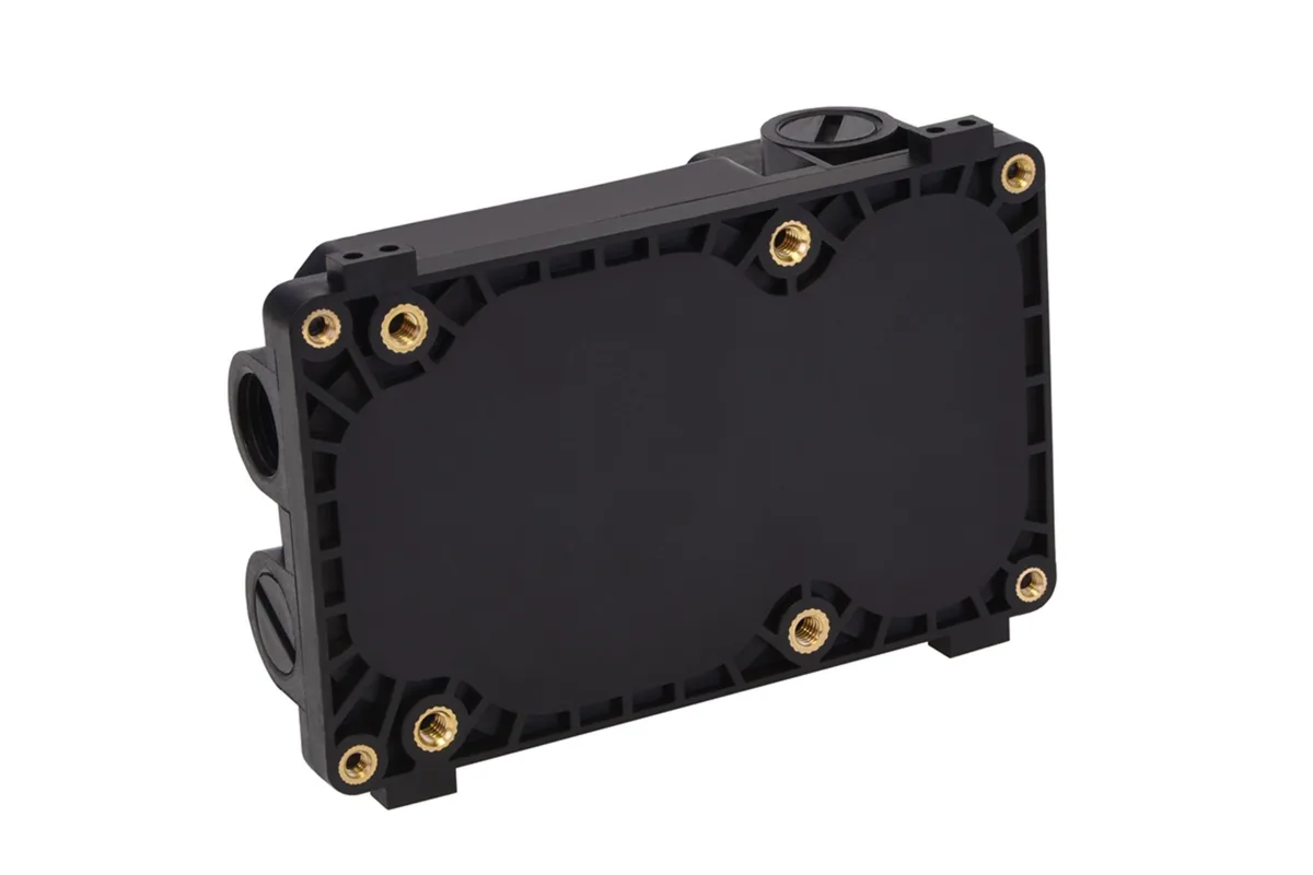 Compact rectangular reservoir with integrated DDC pump top, matte black finish, multiple G1/4 ports on all sides