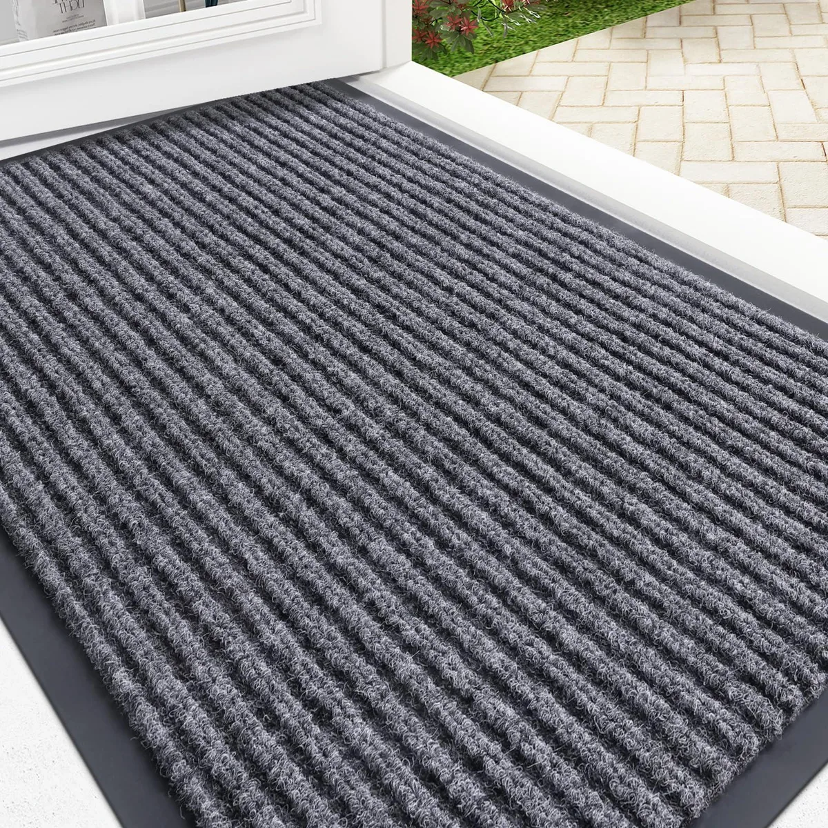 Grey striped doormat, low-profile rectangle, polyester surface with PVC backing