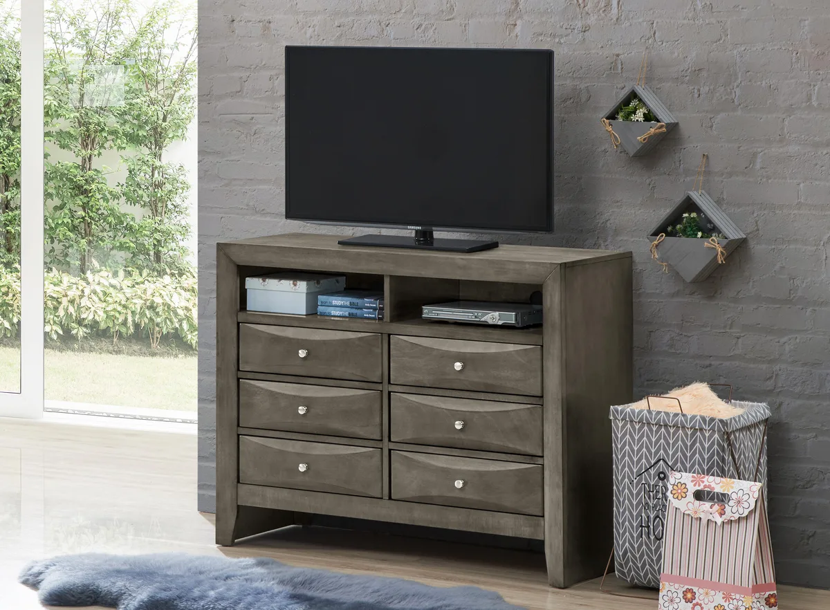 Gray media chest with beveled drawer fronts and wood veneer finish