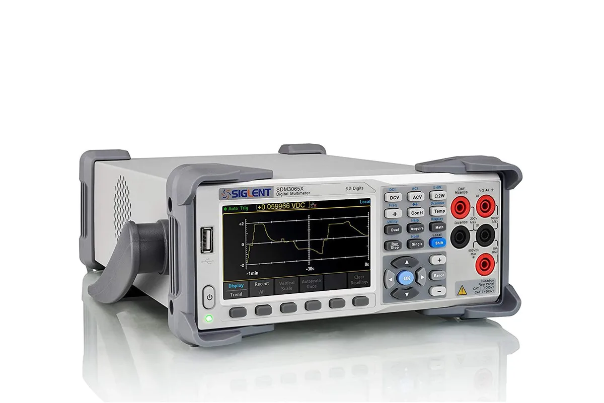 Benchtop digital multimeter with 4.3 inch colour display, dark grey case, front input terminals