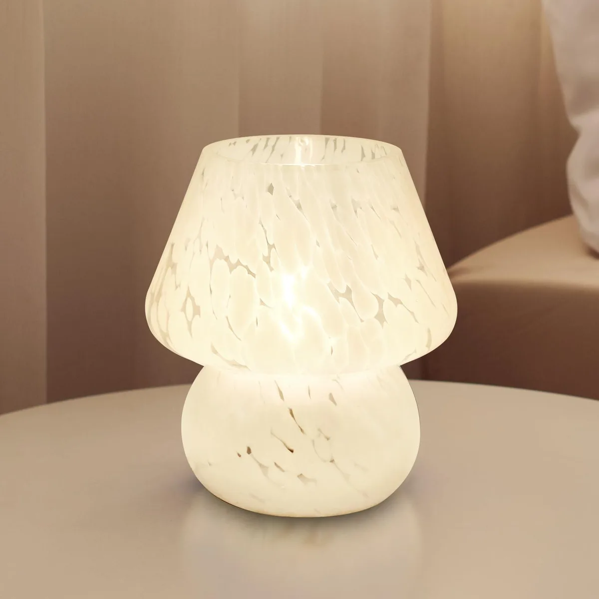 White mushroom-shaped glass shade on stained ceramic base, inline dimmer switch, compact table lamp