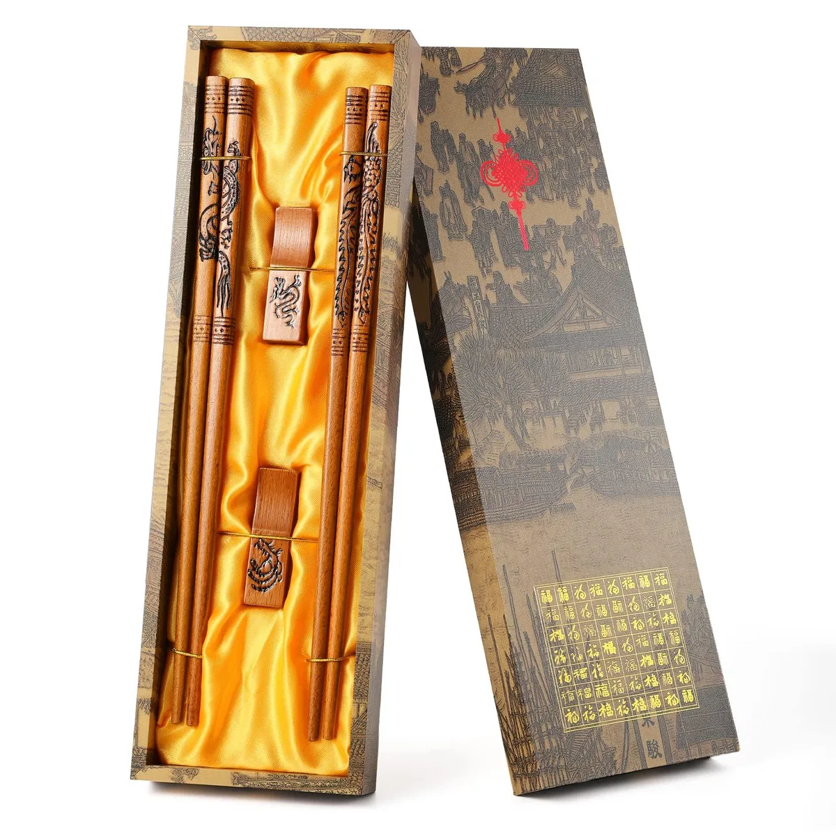 Red wooden chopsticks with dragon and phoenix carvings in a Chinese-style gift box with holders and cloth bag