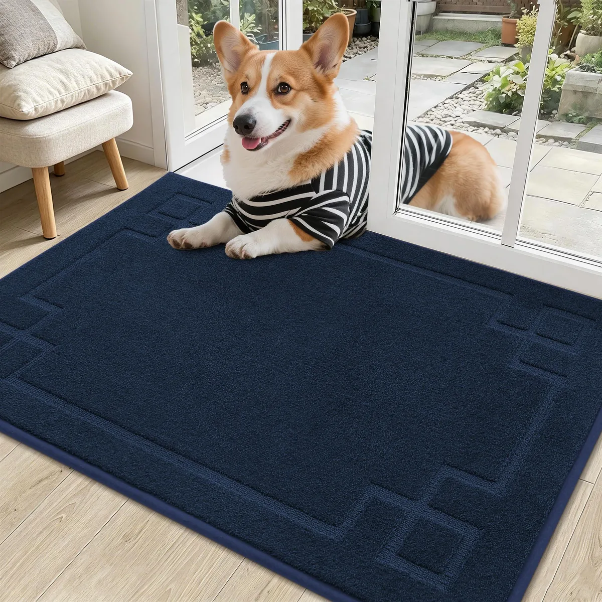 Navy blue rectangular door mat with geometric pattern, low-profile flat finish