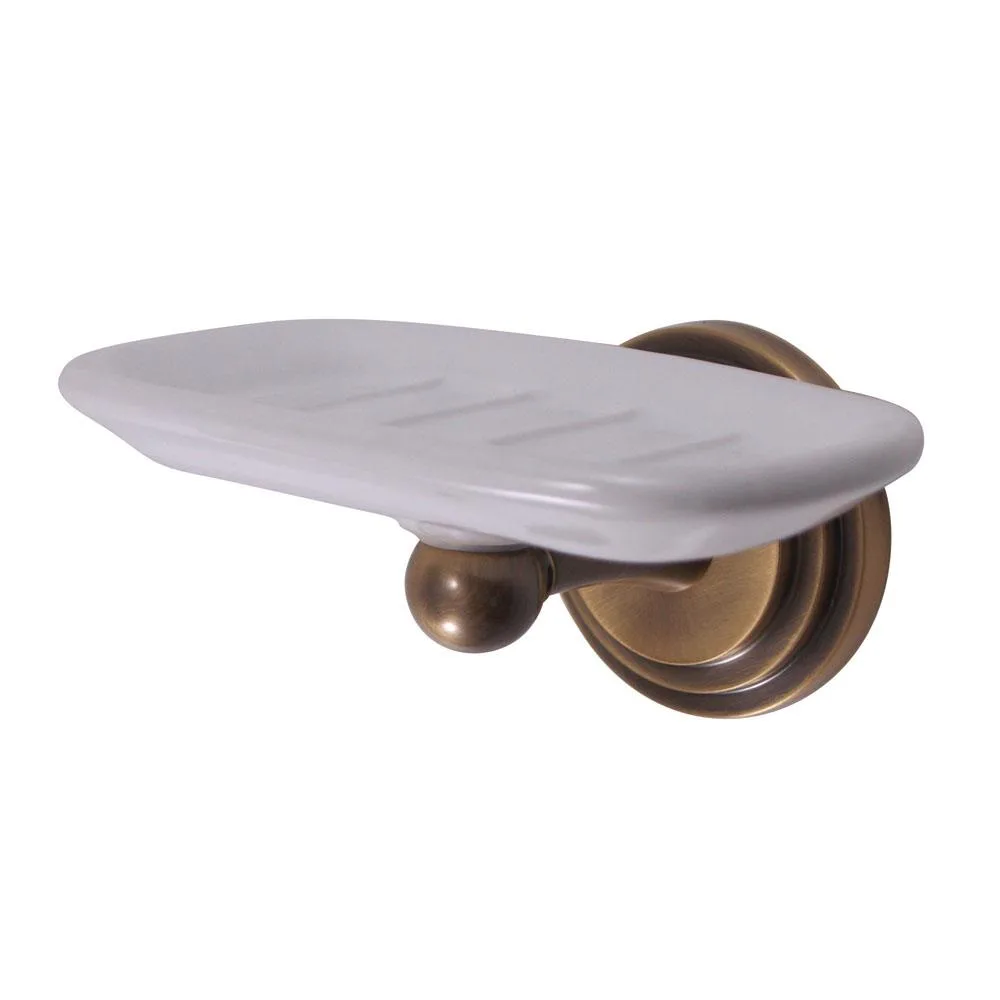 A wall-mounted brass soap dish with a vintage brass finish, rectangular shape and open wire design