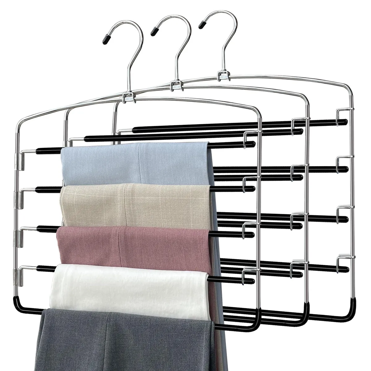 Three metal pants hangers with five swing arms each, silver finish
