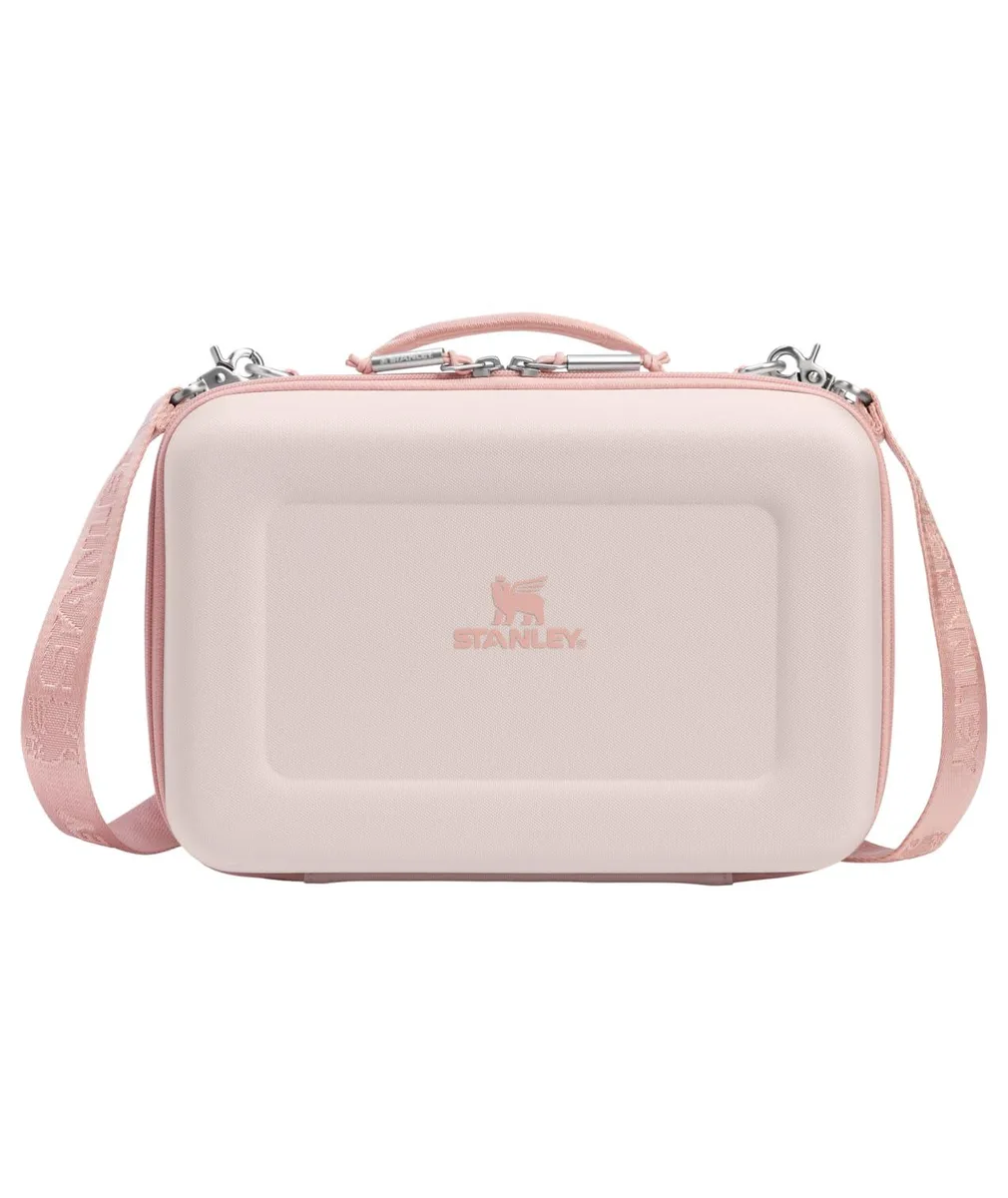 Compact rectangular lunch box in neutral fabric with contrast trim, top handle and adjustable shoulder strap