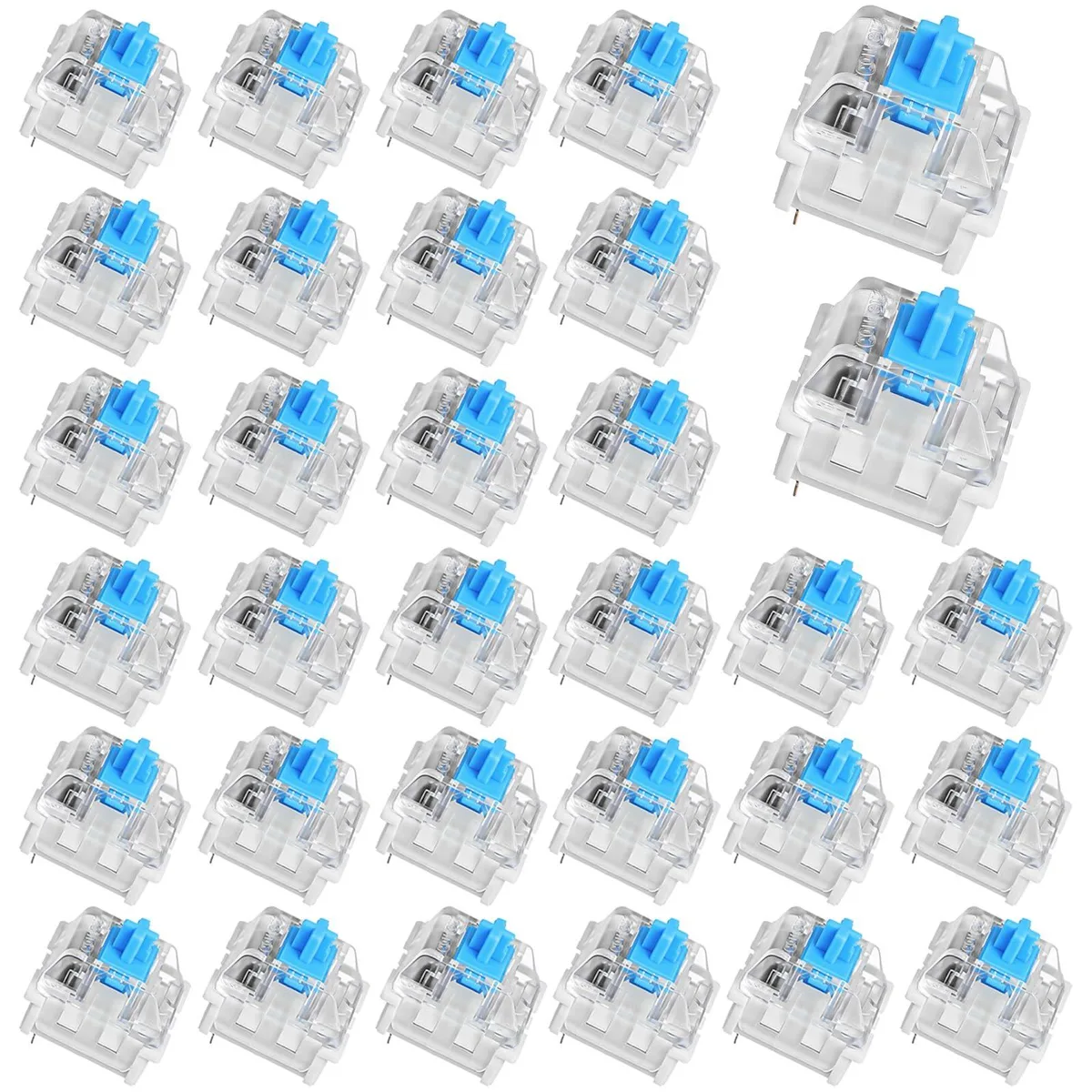 Thirty small blue-and-white mechanical keyboard switches in a loose pile