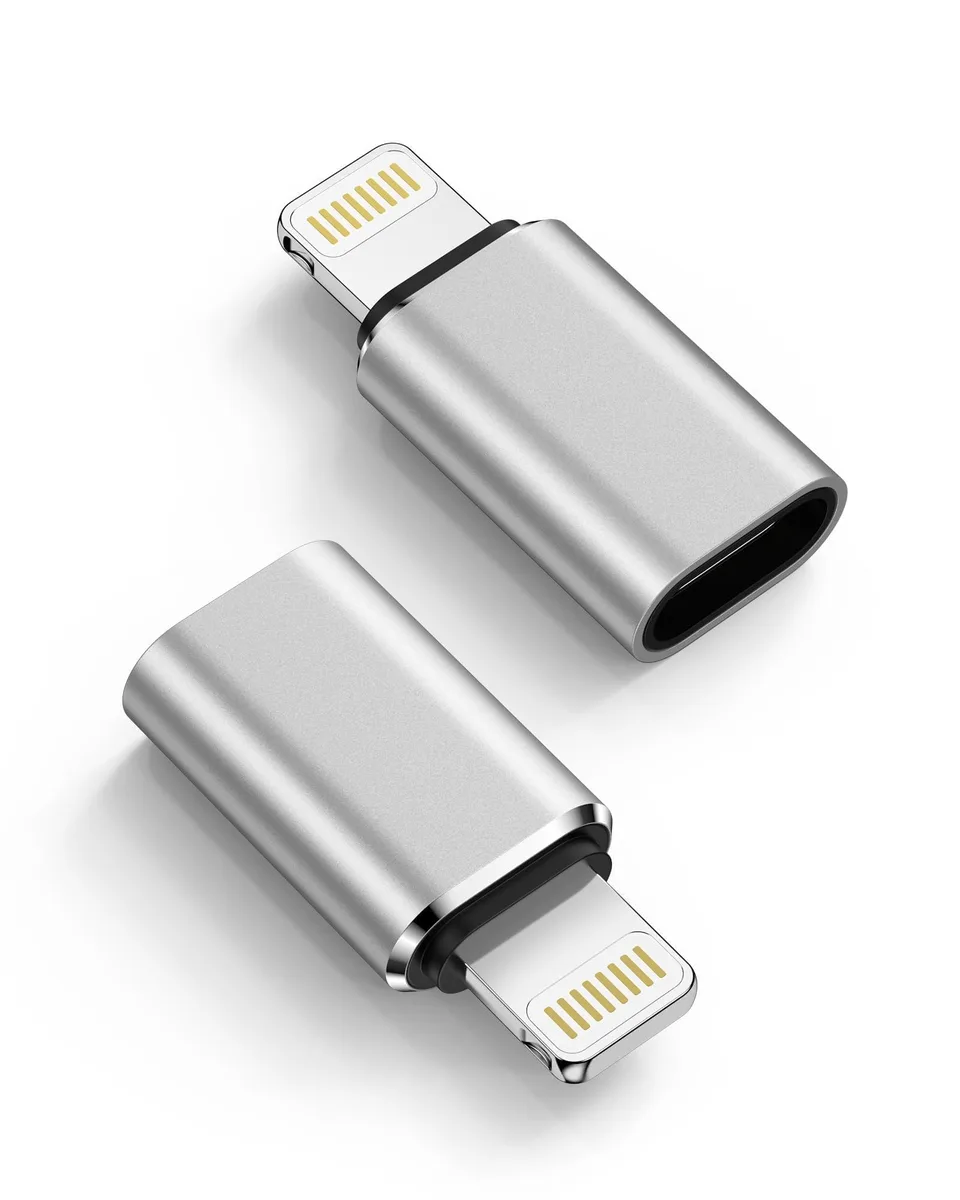 Two small silver USB-C to Lightning adapters side by side
