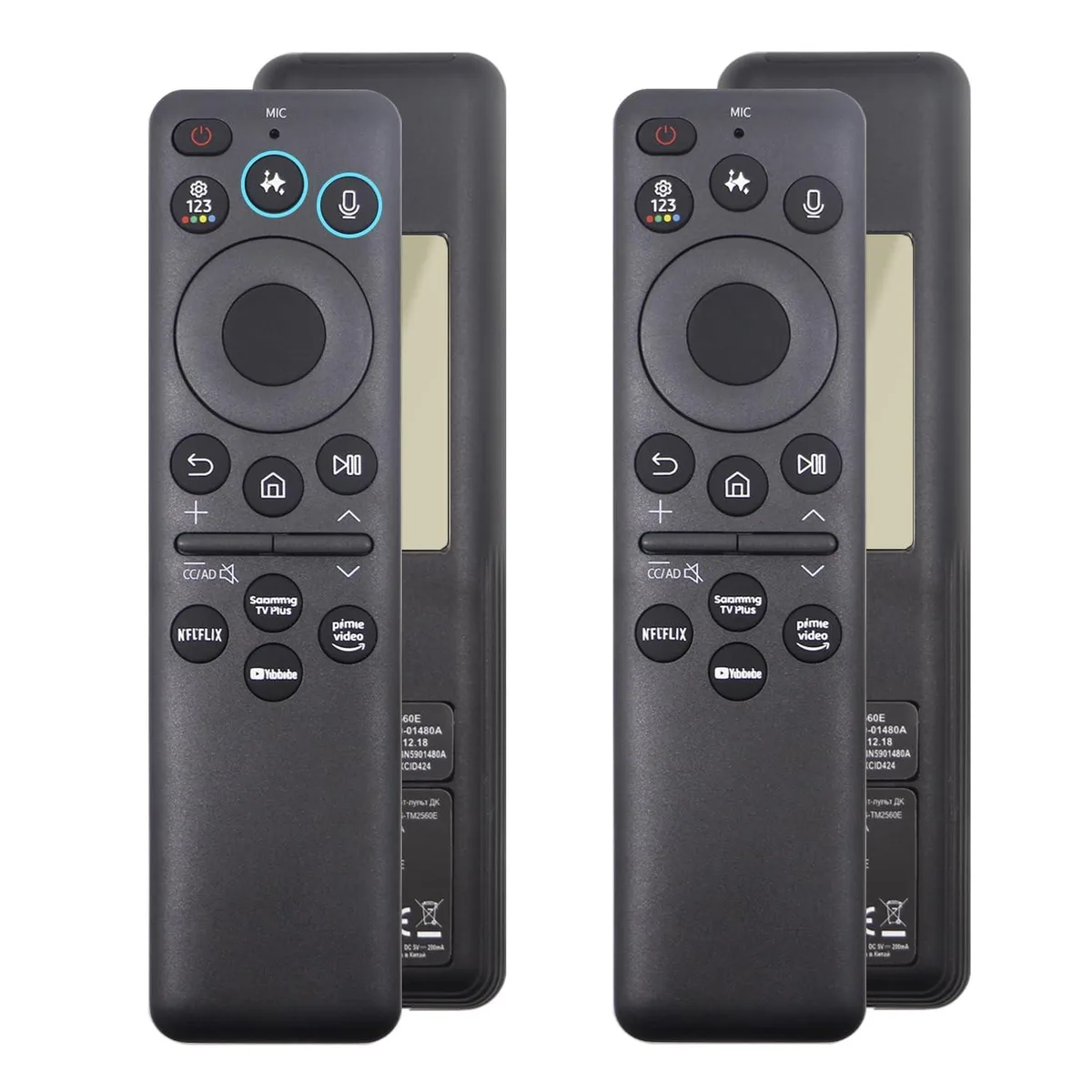 Two black TV remotes with solar panels and USB-C ports