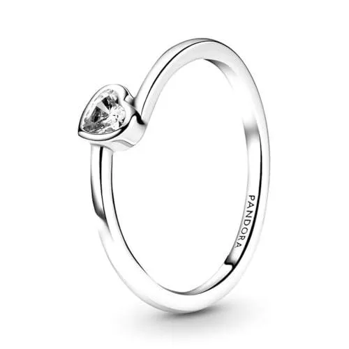 Sterling silver ring with thin polished band and tilted clear heart-shaped solitaire stone