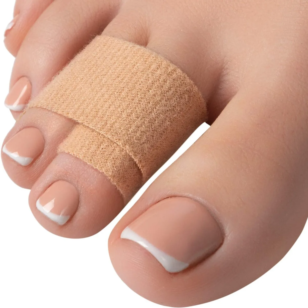 Four beige fabric toe wraps laid flat, soft double-layer material visible