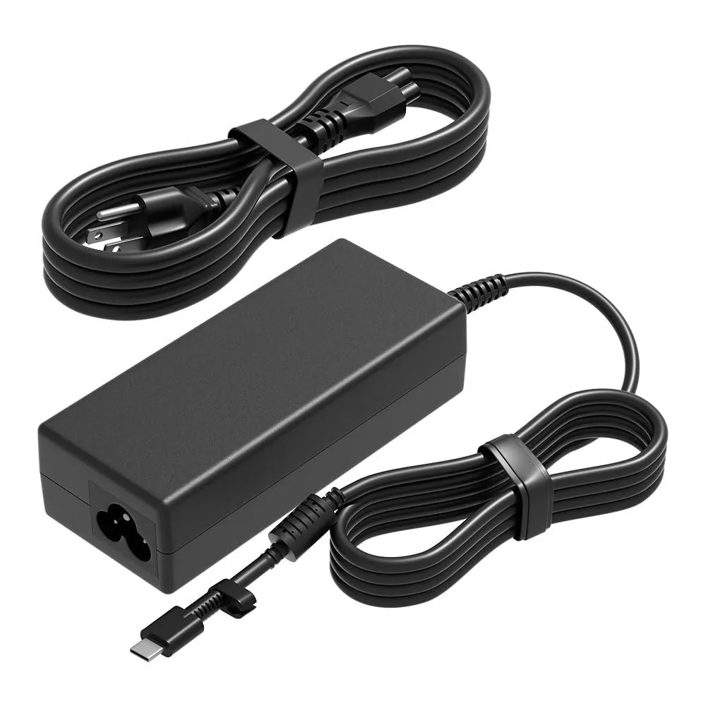 Compact USB-C laptop charger with detachable cable, matte black finish