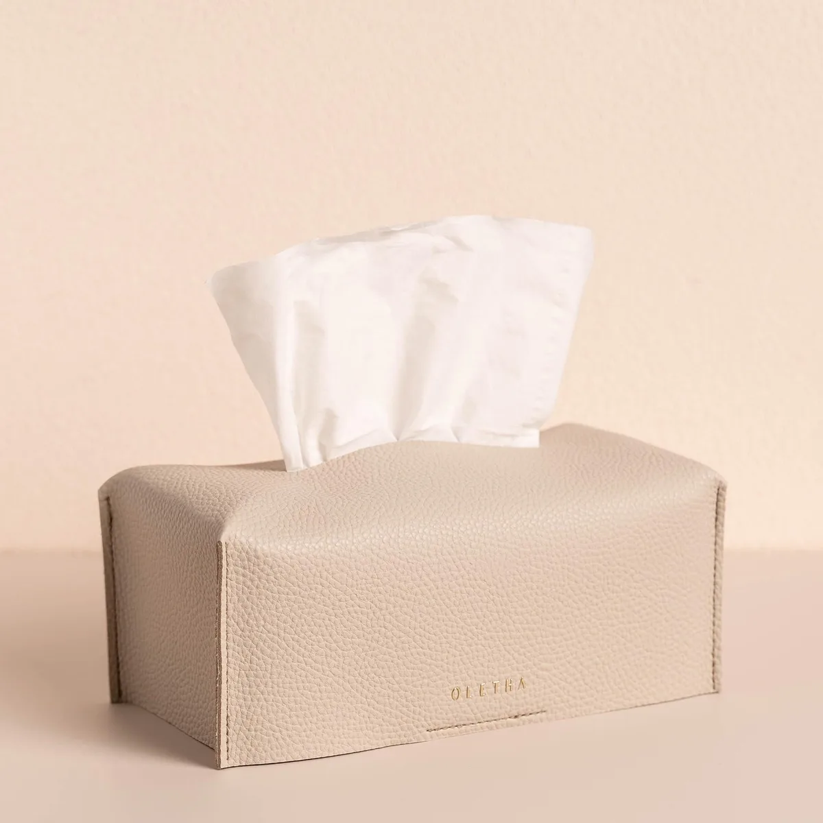 Light taupe rectangular tissue box cover with leather-look finish and Velcro strap