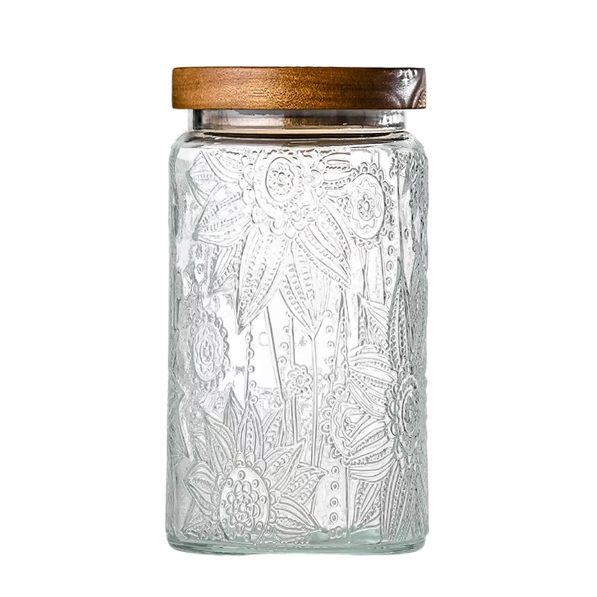 Clear glass jar with embossed sunflower design and wooden lid