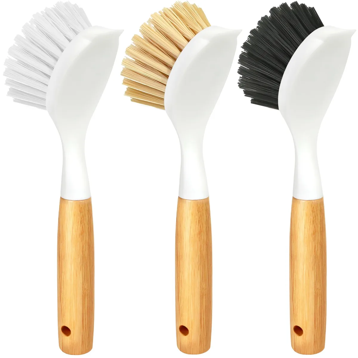Three bamboo-handled dish brushes in white, yellow, and black with varying bristle stiffness