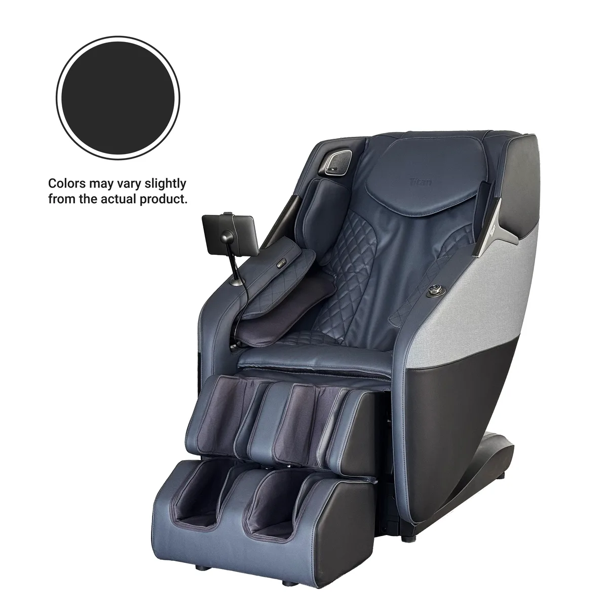 Large recliner in dark upholstery with extended footrest and visible air compression cells