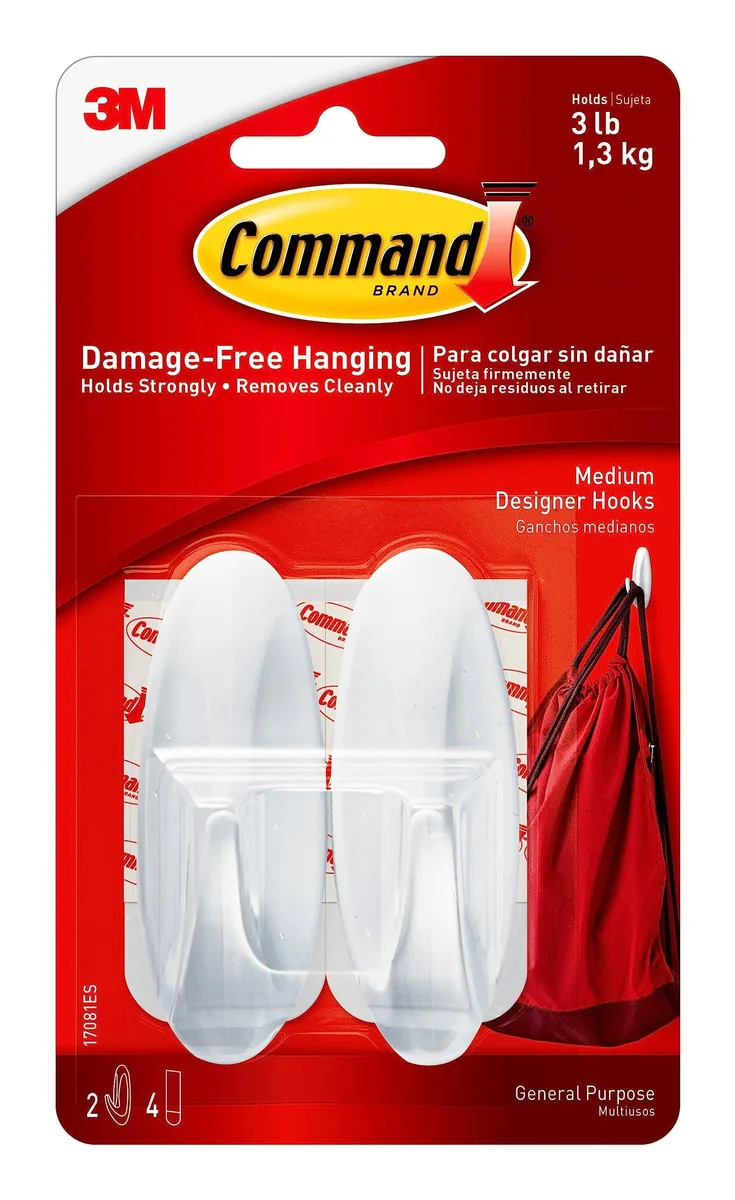 Two white medium designer hooks with four adhesive strips