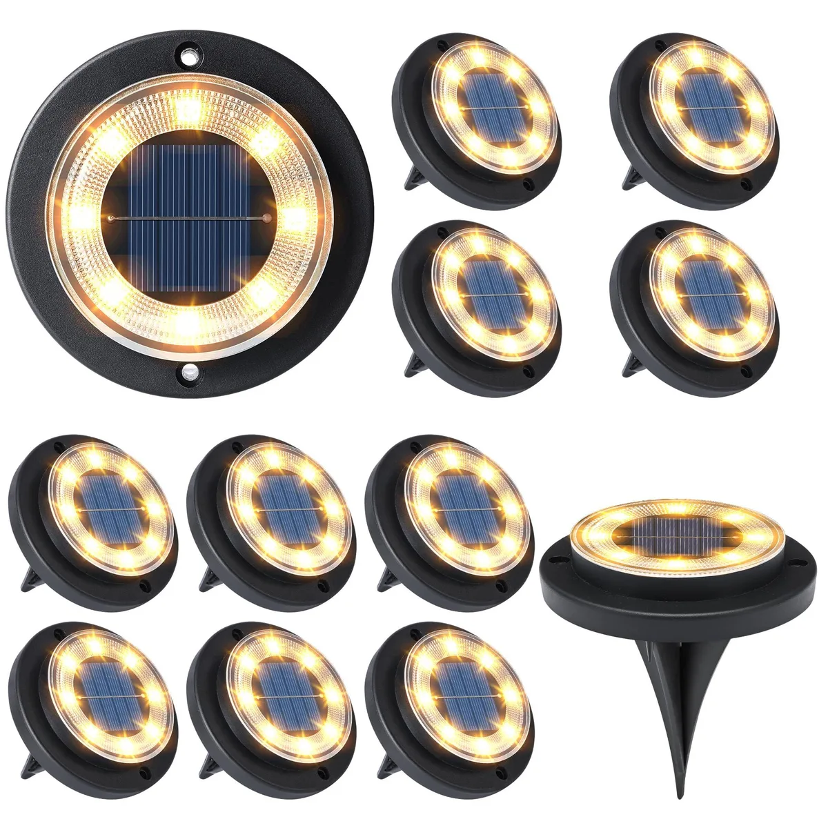 Twelve warm-white solar disk lights in polished chrome resin, each four inches wide, stake or screw mount