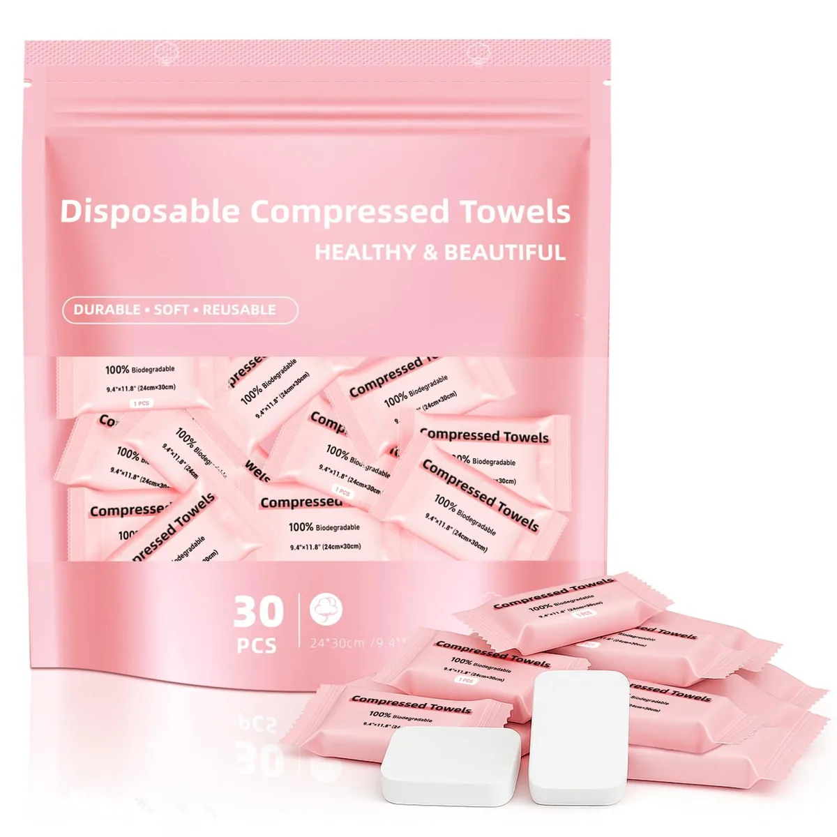 A stack of 30 small white compressed towel tablets in individual wrappers