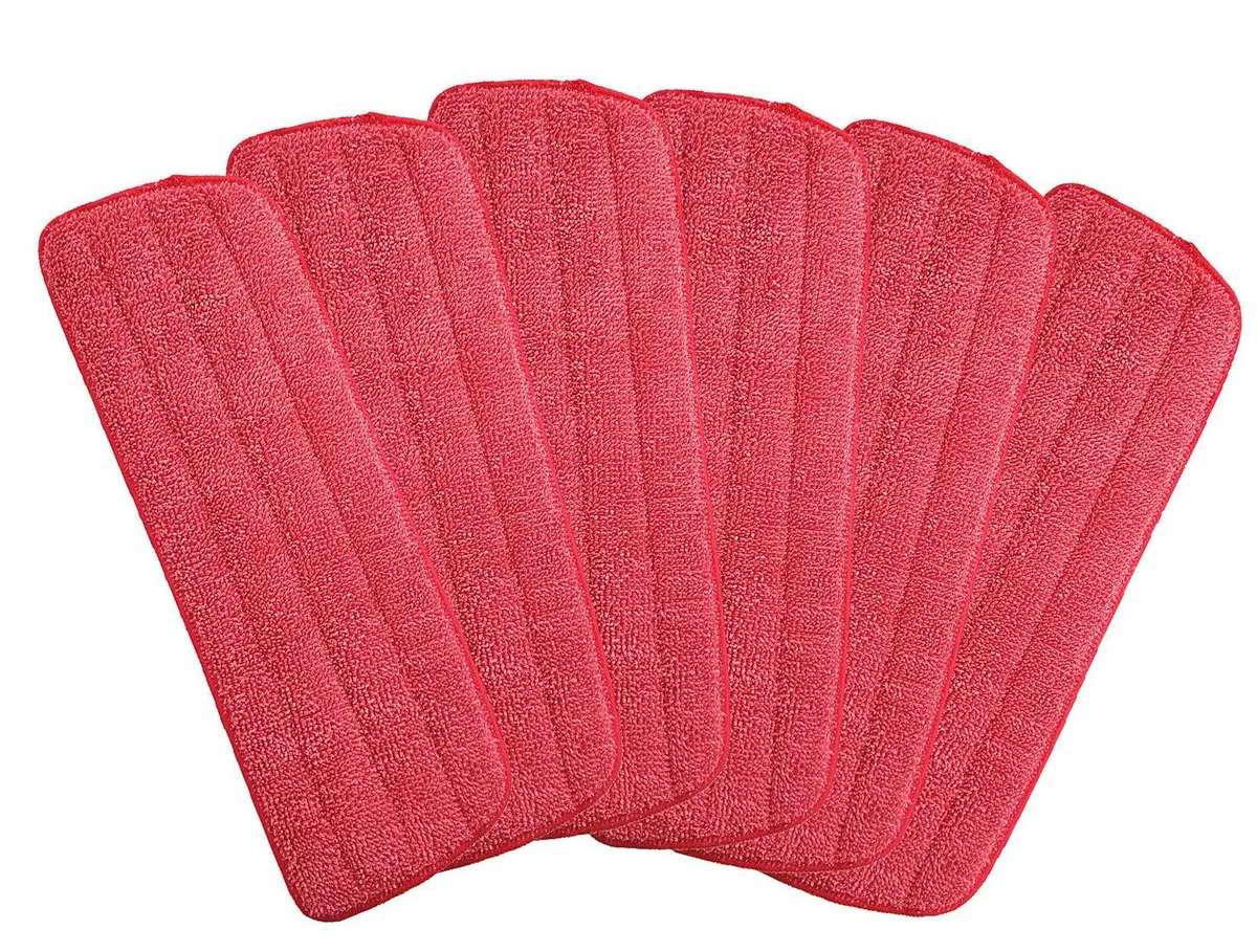 Six red microfiber mop pads folded in clear packaging