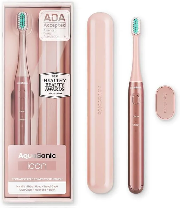 Blush pink electric toothbrush with magnetic holder and slim travel case