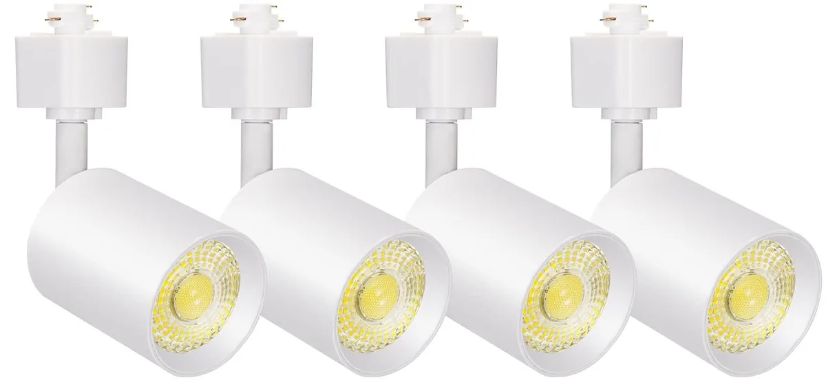 Four white cylindrical LED track heads on H-type adapters