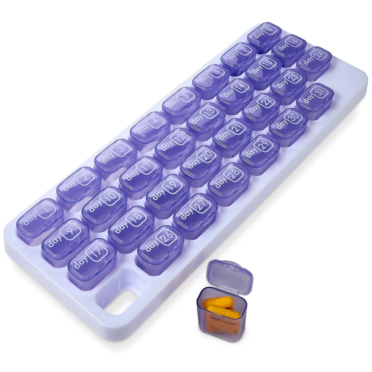 Purple plastic monthly pill organiser with 31 numbered translucent-lidded pods in a white tray