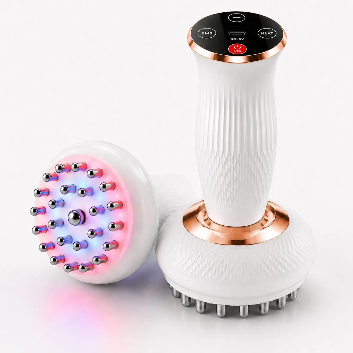 White handheld massager with gold accents, compact rounded shape