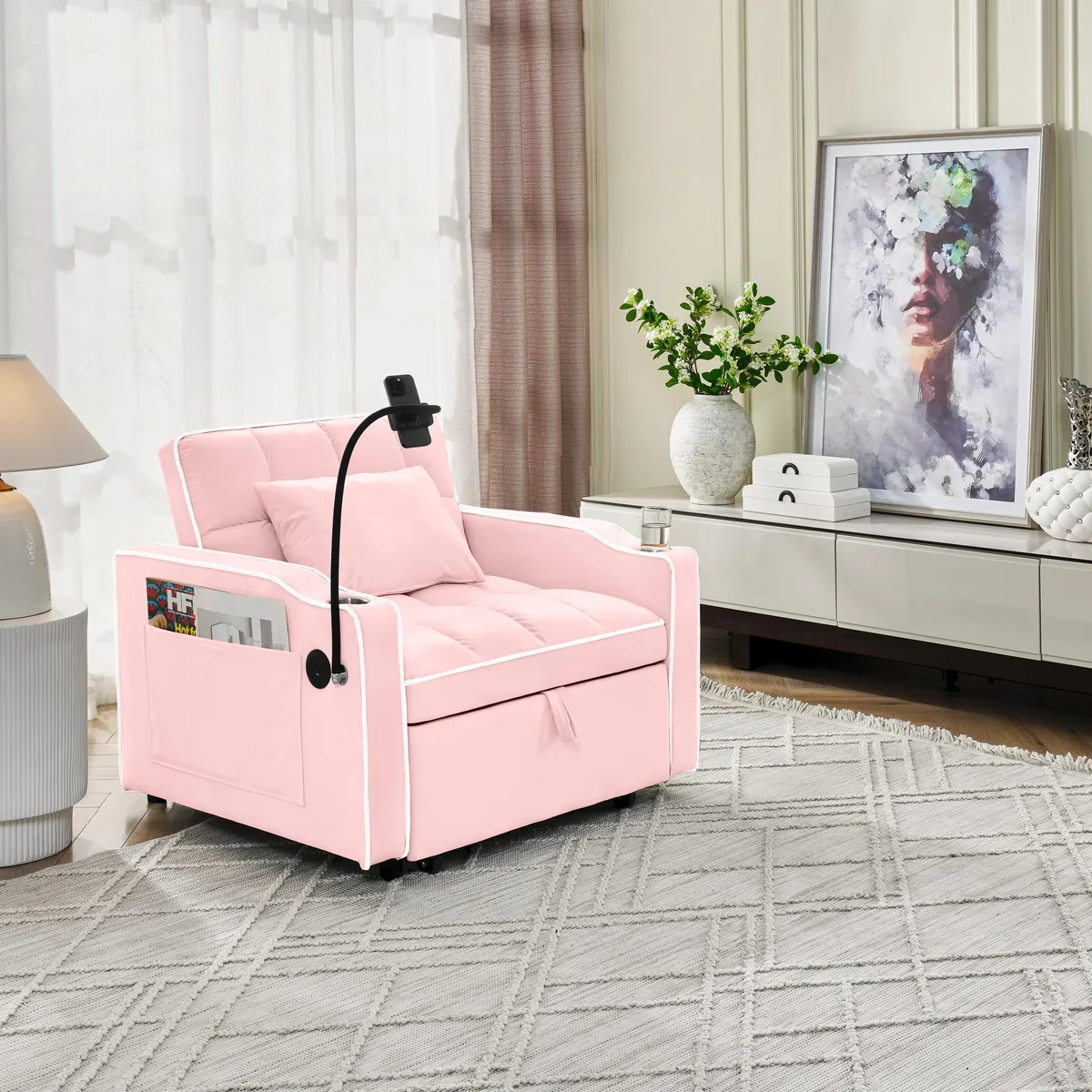 Pink velvet convertible sleeper chair with pull-out bed
