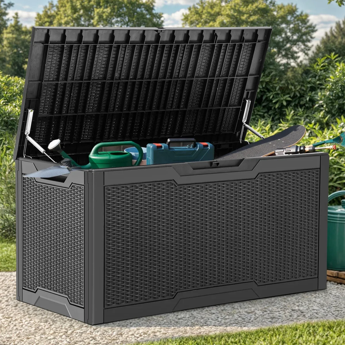 Black rattan-weave resin deck box with hinged lid and side handles, rectangular bench form