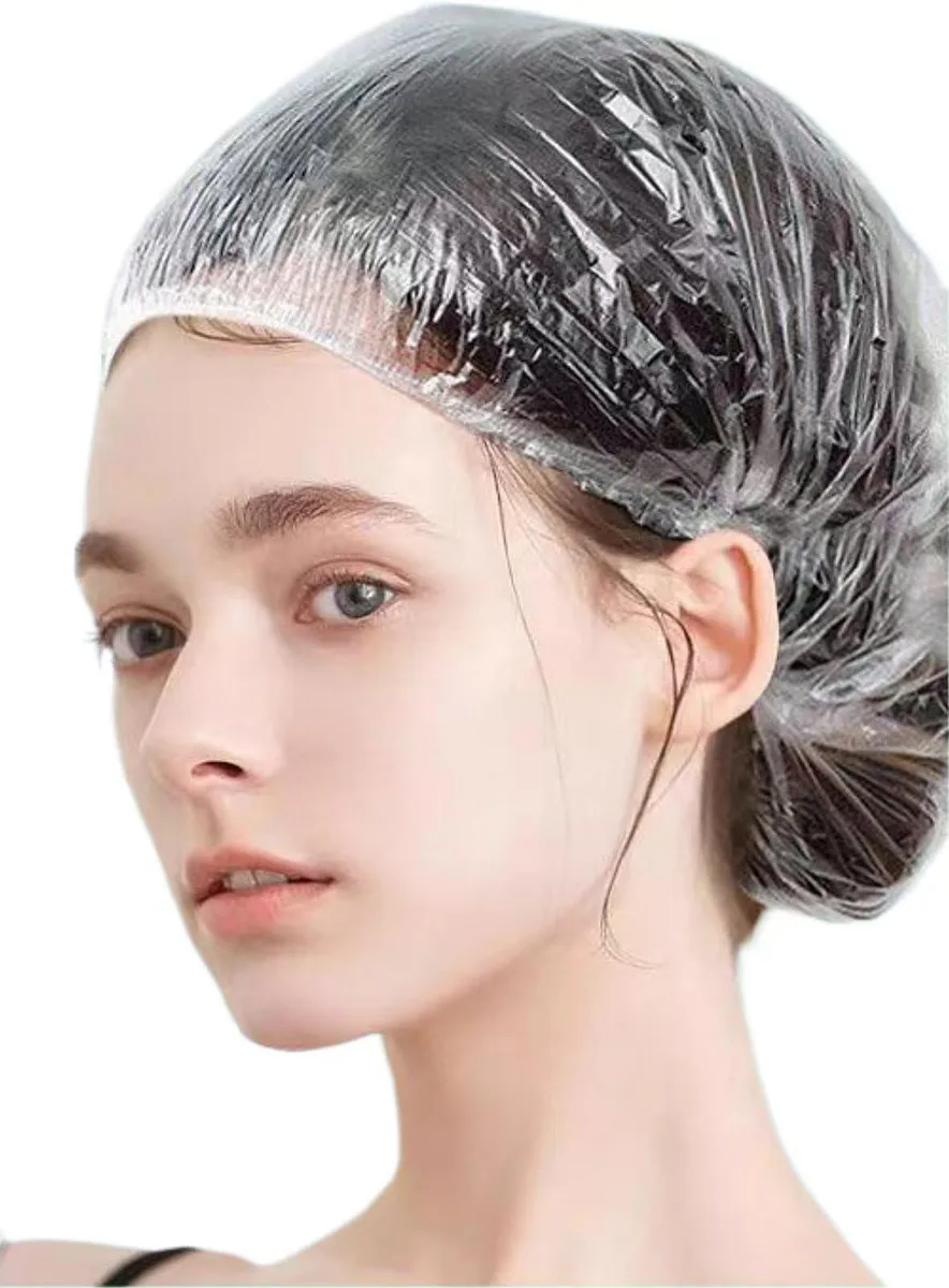 A clear plastic shower cap, 9.8 inches diameter, elastic edge, 200 count pack