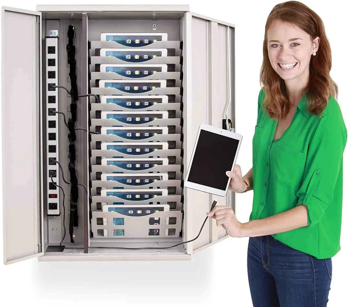 White wall-mounted steel cabinet with tilted slots for twelve tablets, front lock and internal power strip